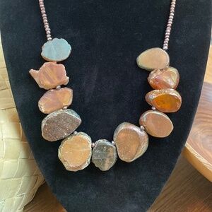 Lovely sliced agate necklace with copper heshi. 18 inches long.